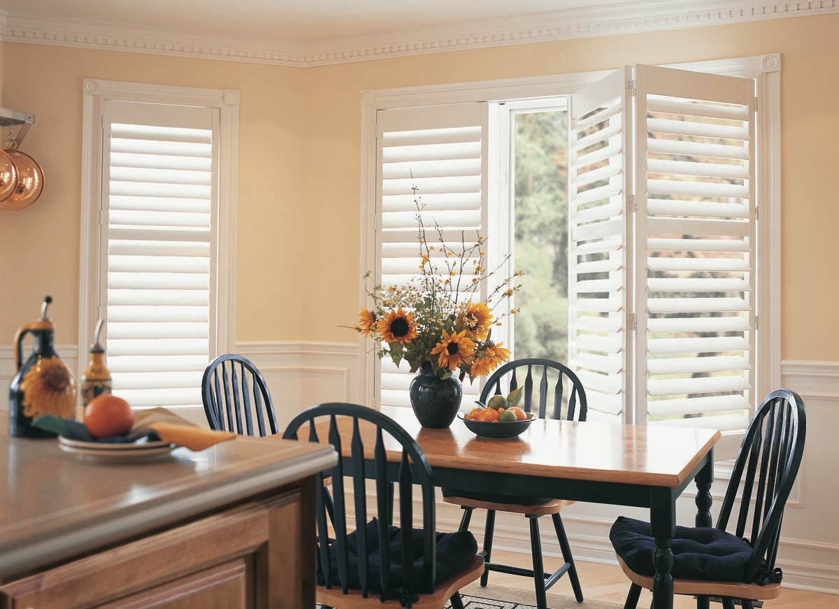 Kitchen window treatments for homes near Poulsbo, Washington (WA) including custom Hunter Douglas shutters.
