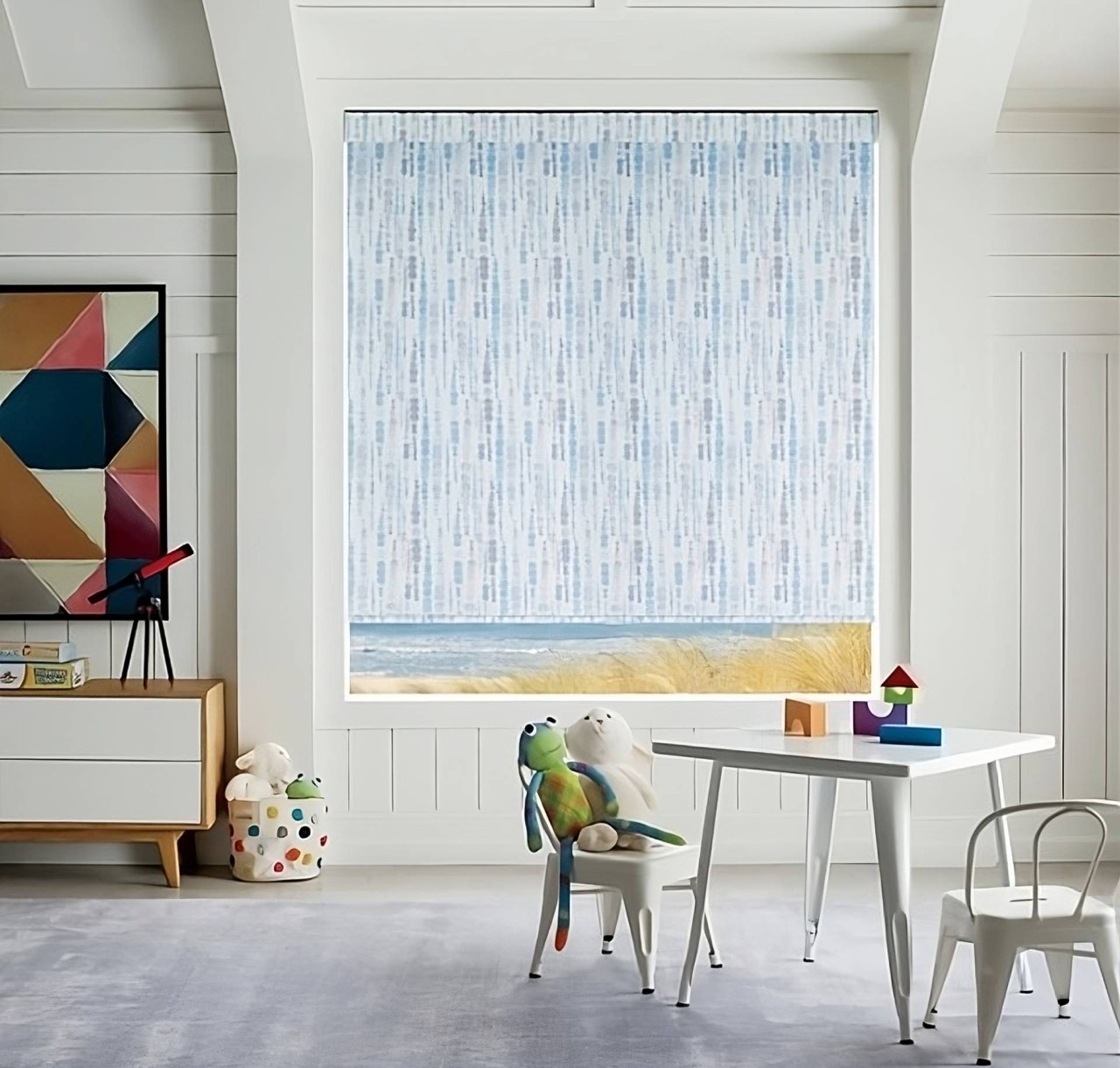 Light blue Hunter Douglas Designer Roller Shades with geometric designs near Bainbridge Island, WA