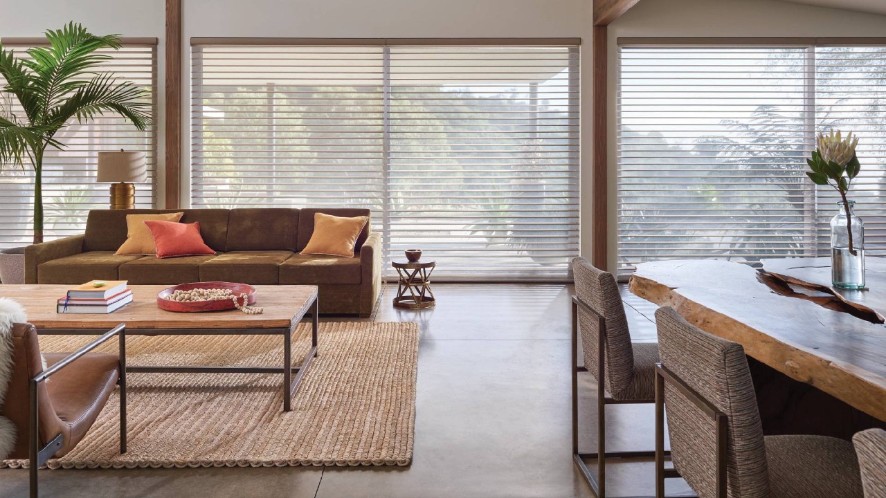 Large and bright home interior with windows outfitted with Hunter Douglas blinds and PowerView® Automation near Bainbridge Island, WA