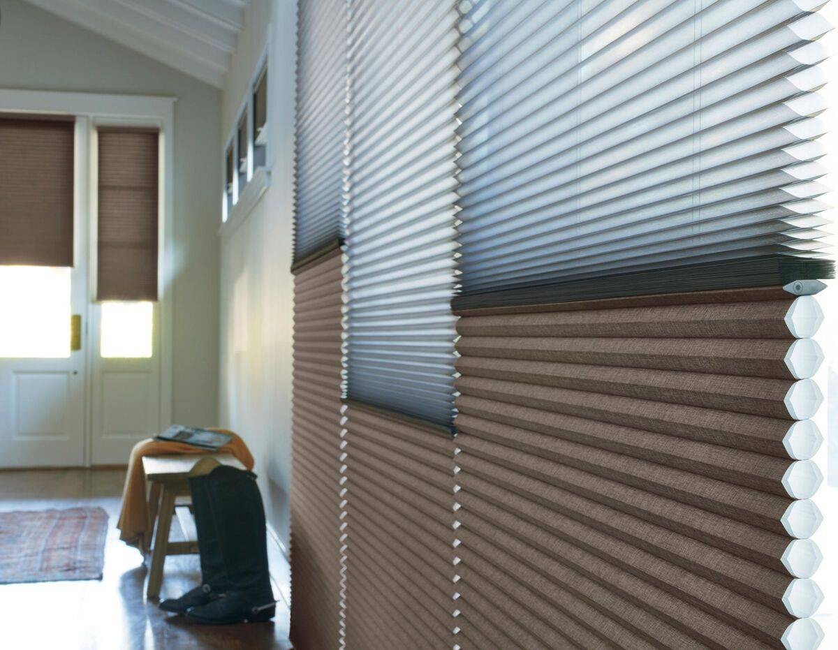 Home’s front foyer with many windows all outfitted with Hunter Douglas Duette® Cellular Shades at Eagle Harbor Window Coverings near Bainbridge Island, WA
